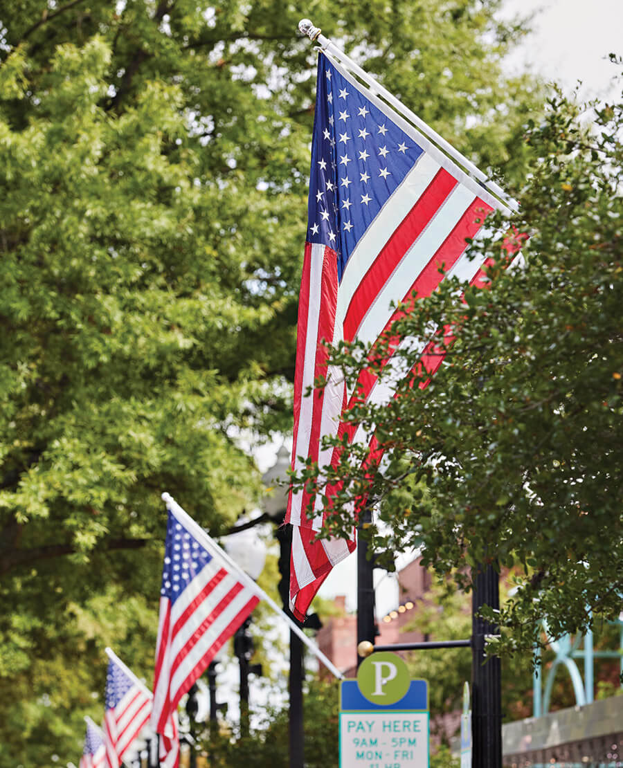 American flags fly in downtown Fayetteville