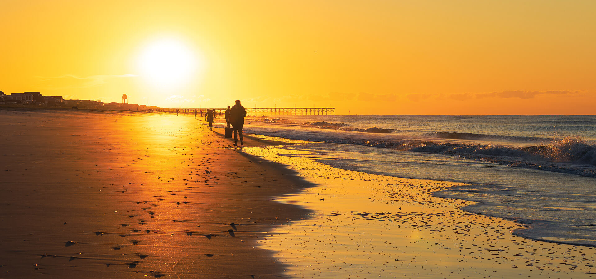People shelling at Holden Beach early in the morning