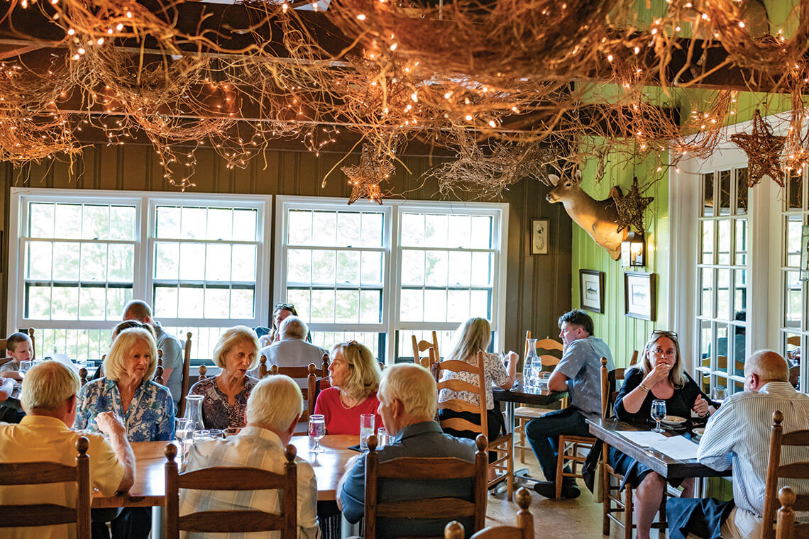 Guests dine in the Vineyard Room at The Gamekeeper. 