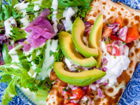 Plate with a savory crepe and salad from Betsy's Crepes in Southern Pines