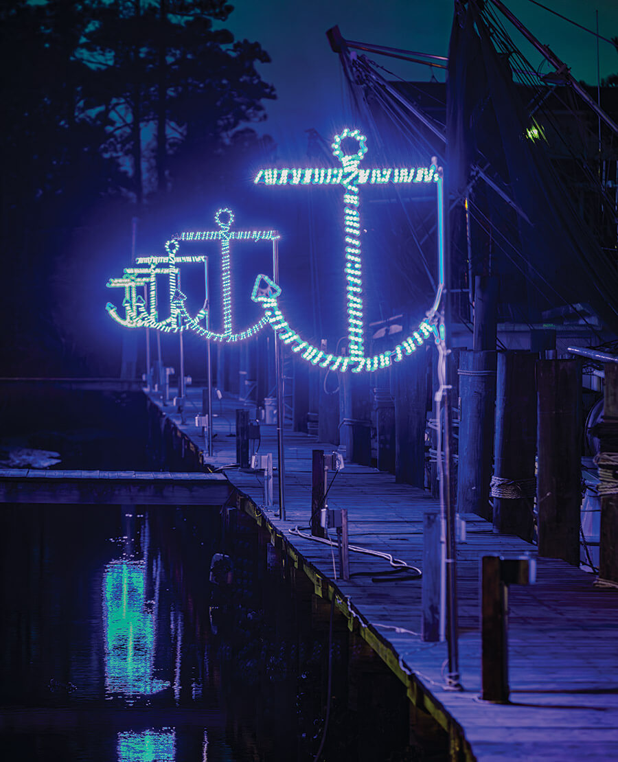 Series of glowing anchors at Harkers Island Boat Dock