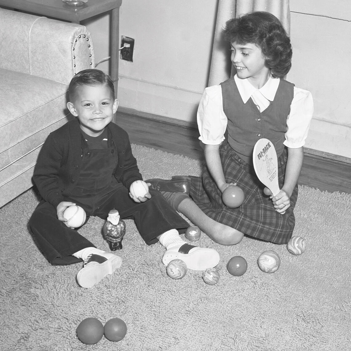 Children playing with Fli-Back toys
