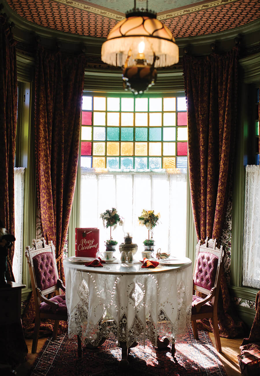 The sitting room in the Lady's Suite with floral arrangements