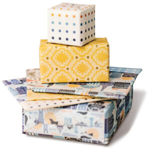 Boxes of presents wrapped in New South Pattern House wrapping paper