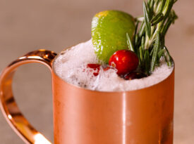 Cranberry mule in copper cup