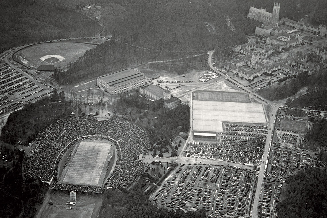 Aerial view of cars filling parking lots surrounding Duke Stadium for the Rose Bowl