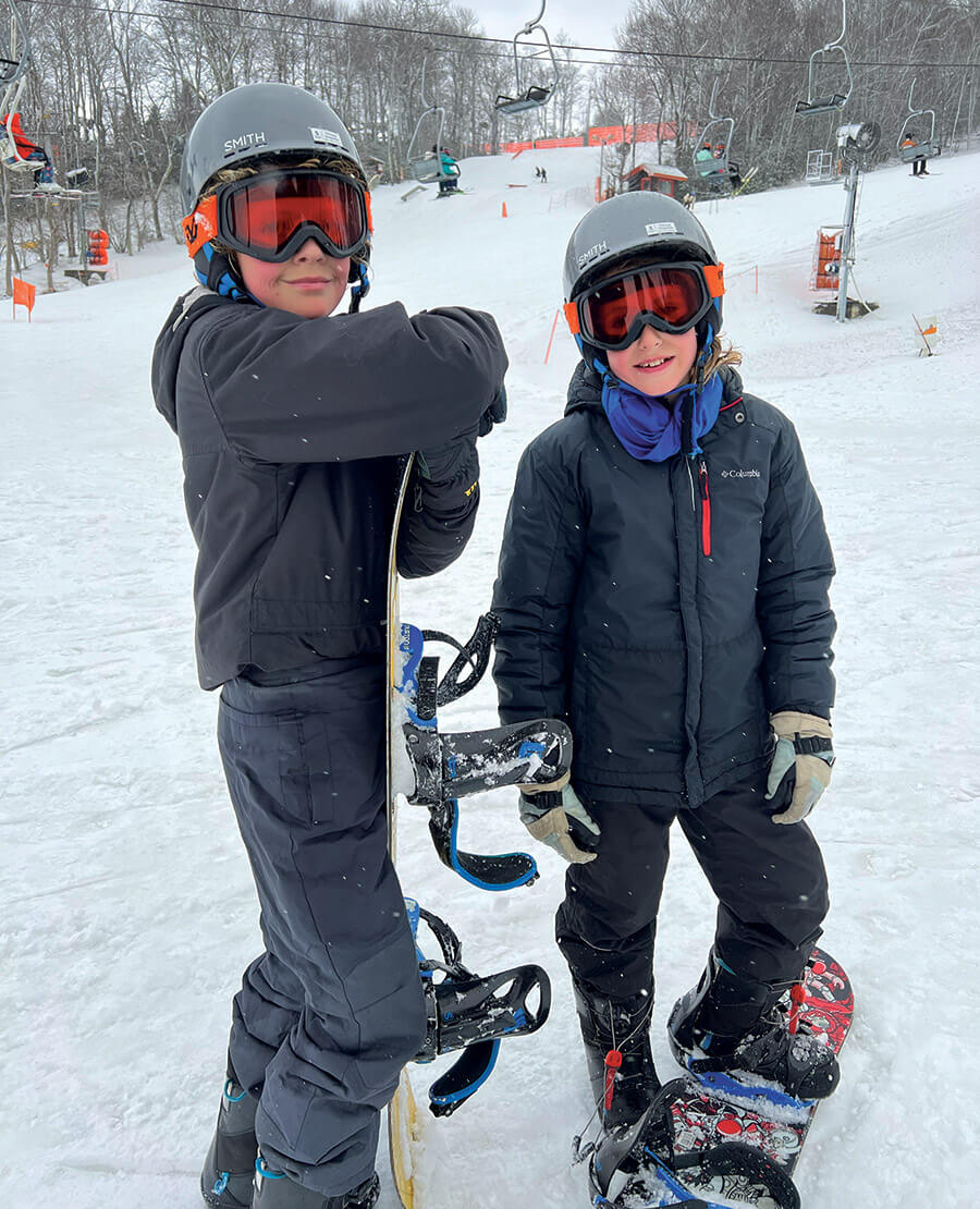 Tomas and Nico snowboarding at Appalachian Ski Mountain