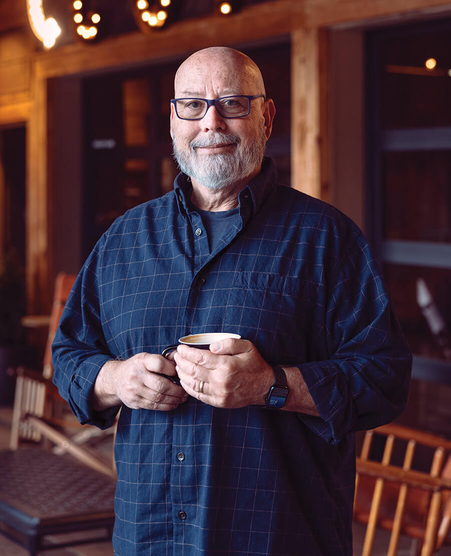 Bald Guy Brew owner Don Cox with a cup of coffee