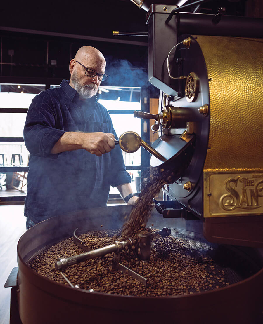 Don Cox roasting beans at Bald Guy Brew in Boone