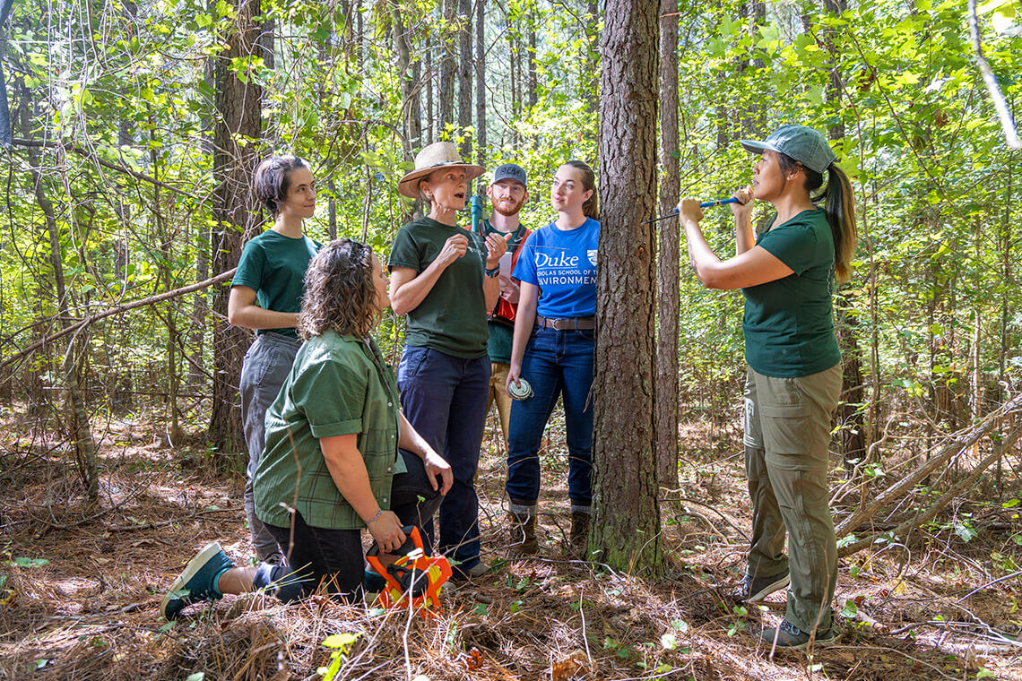 Students in Duke Forest Teaching & Research Laboratory learn about forestry management in Duke Forest