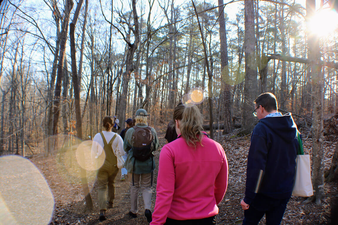 People walking along the Shepherd Nature Trail