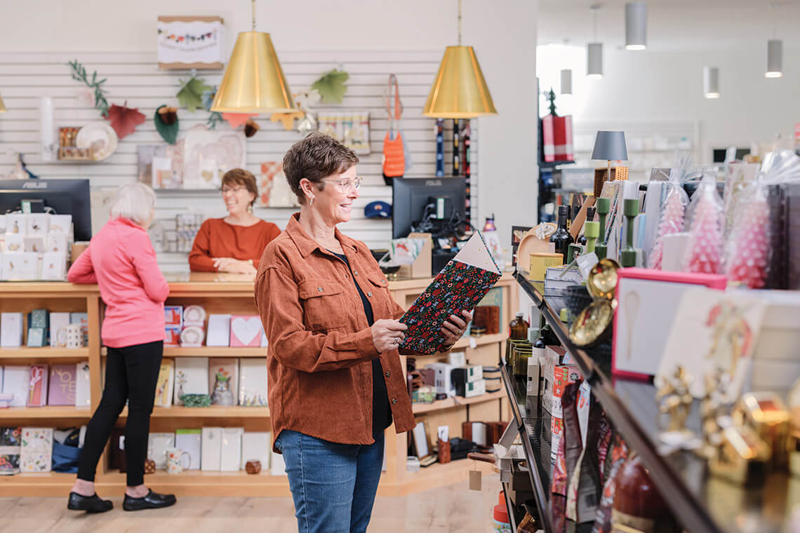 Janet Newell at work at If It's Paper in Greensboro, NC
