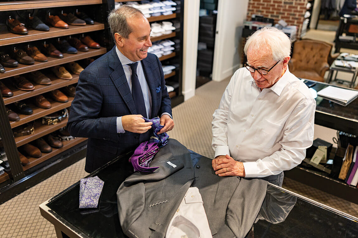 Gerald Arnold shops for a new suit at Kannon's Clothing