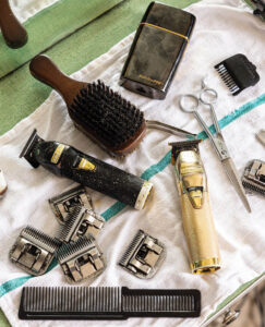 Brush, comb, razor, and other tools at Potts Barber Shop