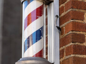 Striped barber shop pole at Potts Barber Shop
