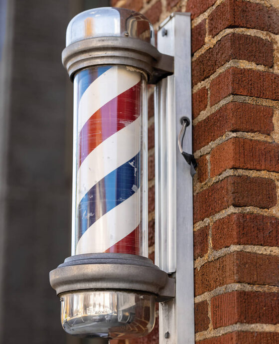 Striped barber shop pole at Potts Barber Shop