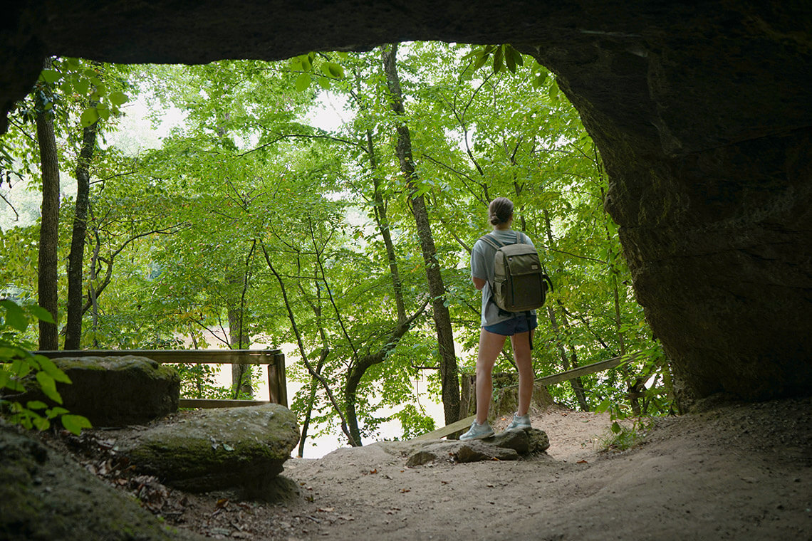 Hiker at Boone's Cave Park in Lexington NC