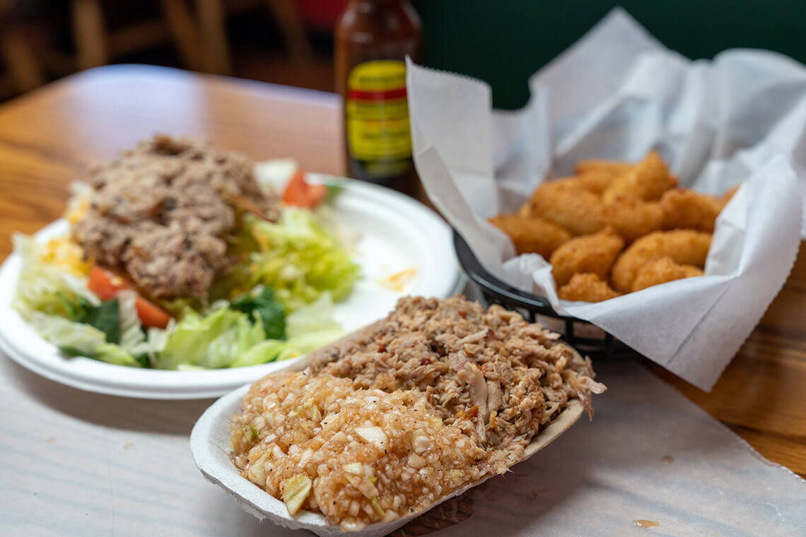 Barbecue, red slaw, and hush puppies at Lexington Barbecue
