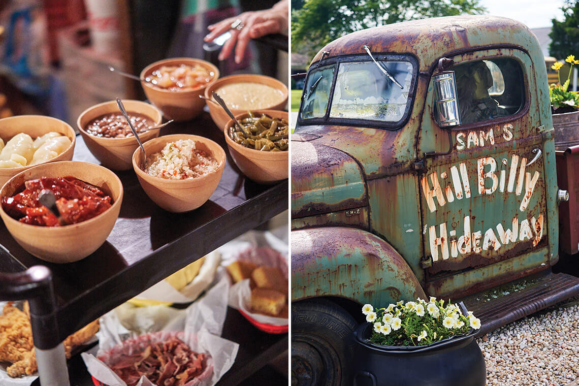 Table full of food and a truck that says HillBilly Hideaway