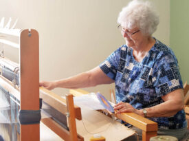 Mary Freas at the loom Lucy Morgan gave her.