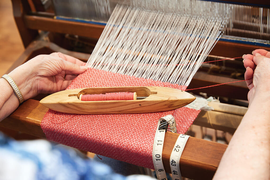 Mary Freas at the loom