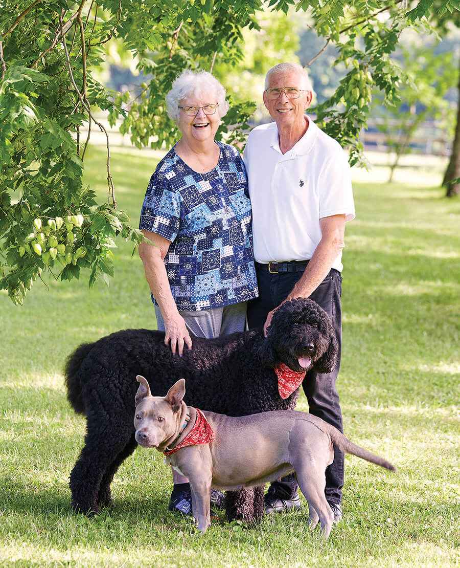 Mary and John with their dogs