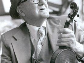 Tommy Jarrell with his fiddle