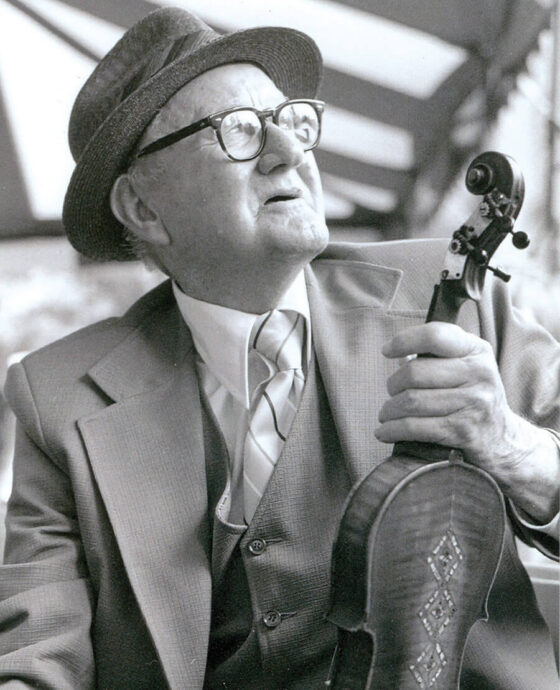 Tommy Jarrell with his fiddle
