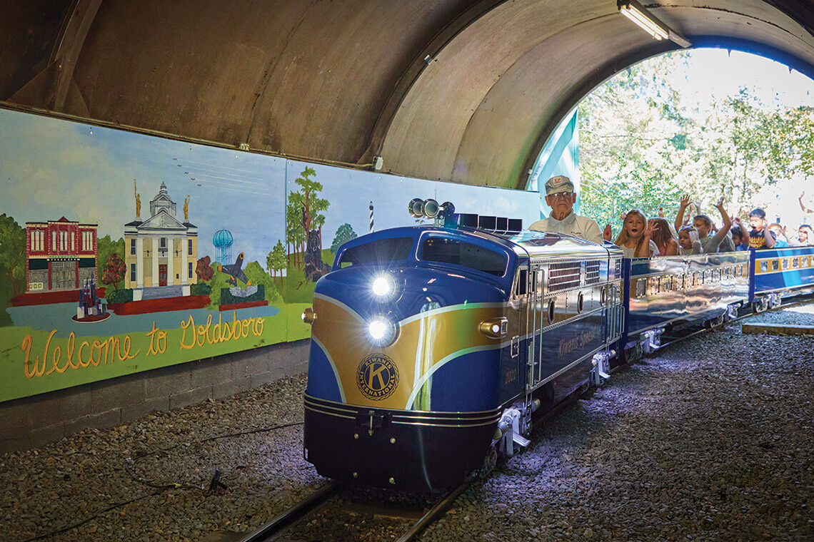 The miniature Kiwanis Special passes through the tunnel