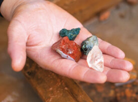 Hand holding gemstones