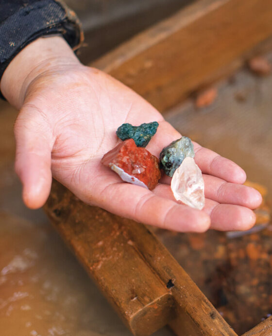Hand holding gemstones