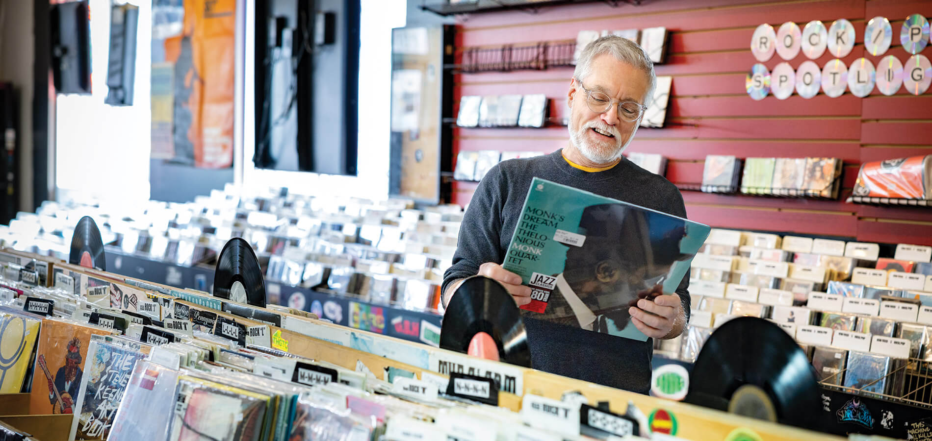 Mark Kemp shops the vinyl selection in a record store