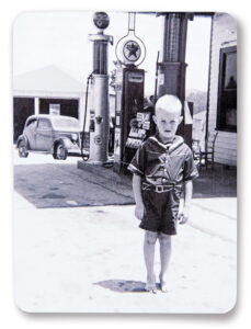 Harris Greene as a child outside of the Grandview Cafe and Cabins