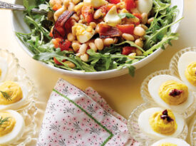 Spring table with egg and bean salad and two types of deviled eggs