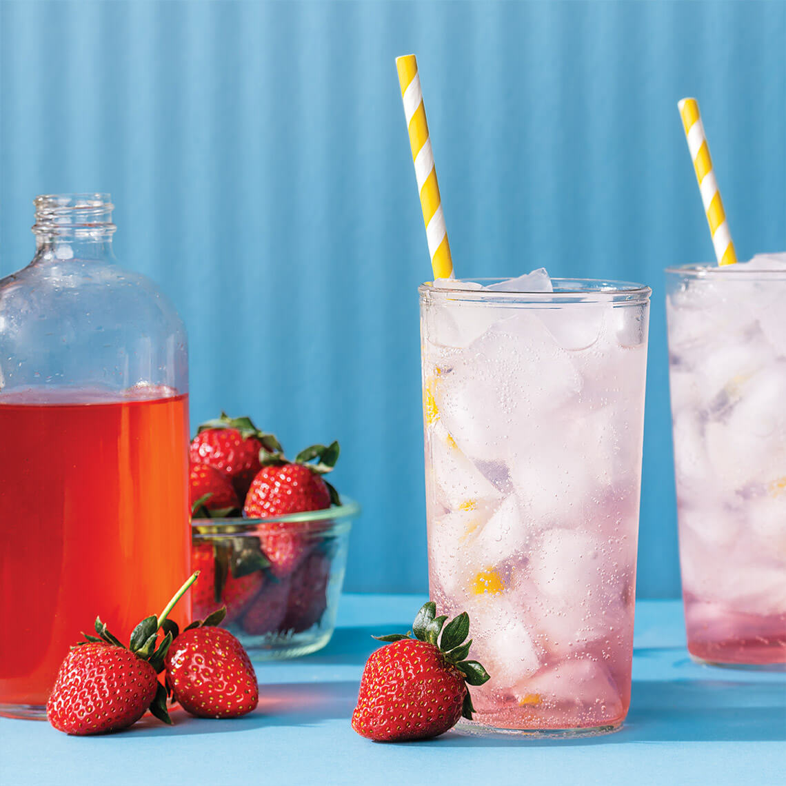 Glasses of strawberry shrub