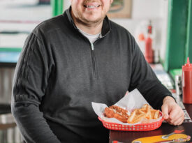 John Champlin pictured with a hot dog