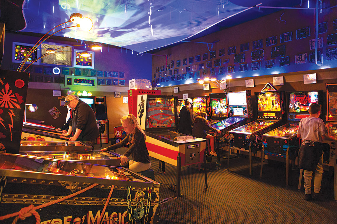 People play pinball at the Appalachian Pinball Museum