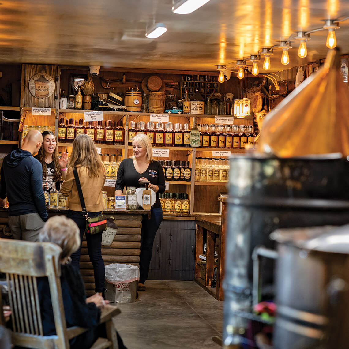 People lead tastings at Walton's Distillery