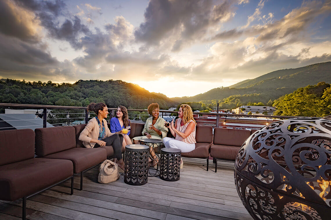 Women with drinks at the rooftop lounge at Horton Hotel in Boone, NC