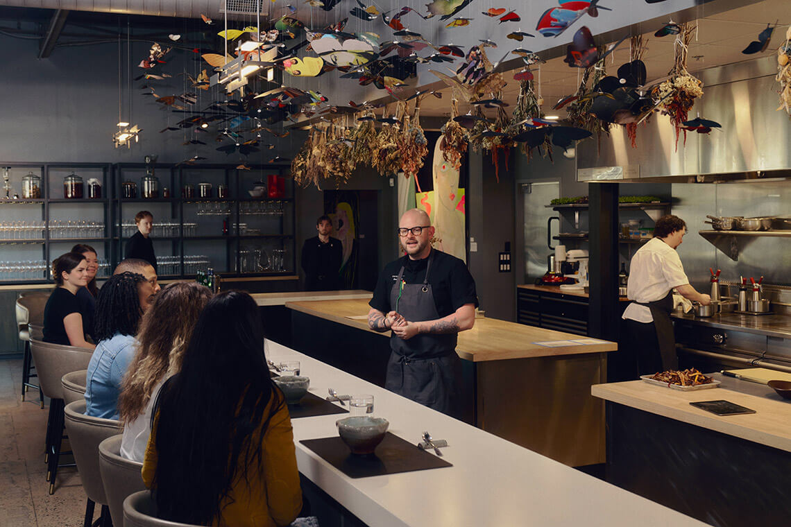 Chef Sam Hart speaks to guests at Counter-