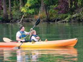 Parent and child kayaking in the Catawba River