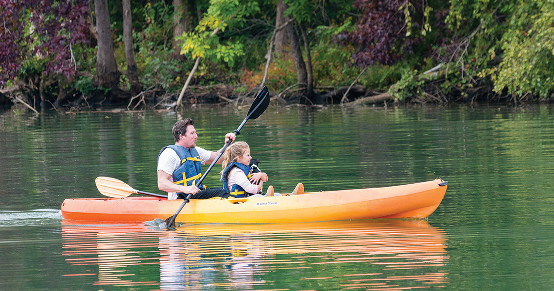 Parent and child kayaking in the Catawba River