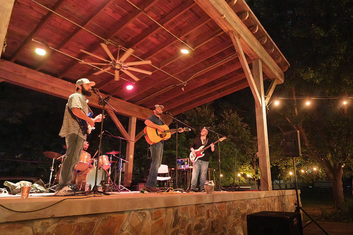 Musicians on stage at 2 Witches