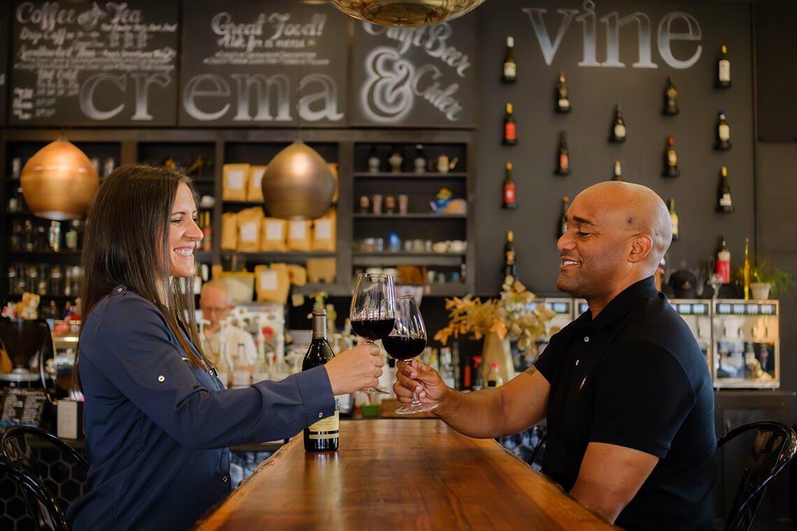 People drink wine at Crema & Vine