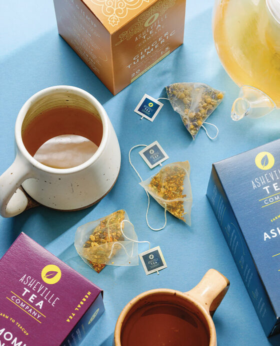 Assorted Asheville Tea Company flavors and steaming cups