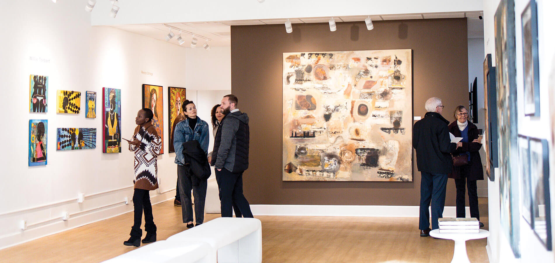 Patrons inside Ella West Gallery