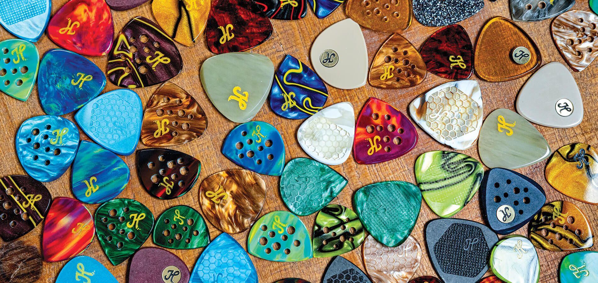 Assorted guitar picks from Honey Picks