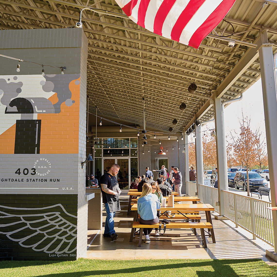 People on the patio at Prime Barbecue