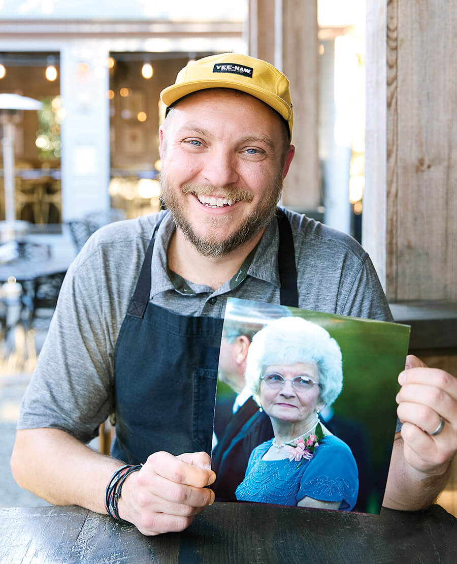 Chef Chris Coleman with a photo of his late grandmother Marlene McDonald