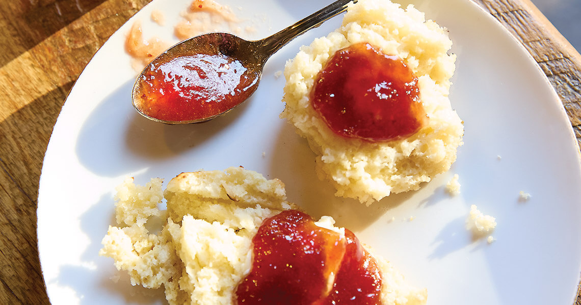 Maw Maw's Cast Iron Drop Biscuits with strawberry figs, a type of jam. 